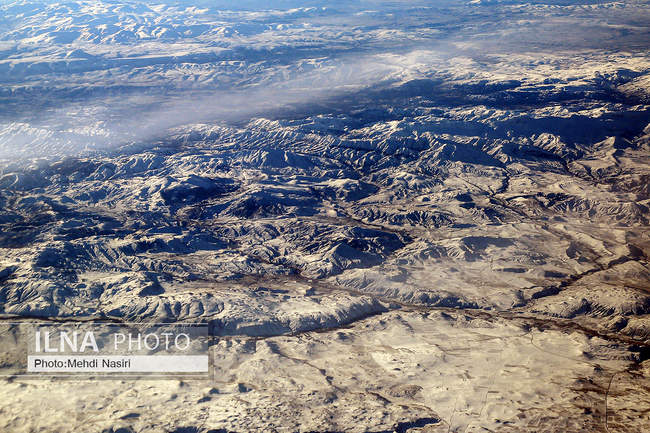 Aerial images of the snowy mountains on the border of Iran and Türkiye