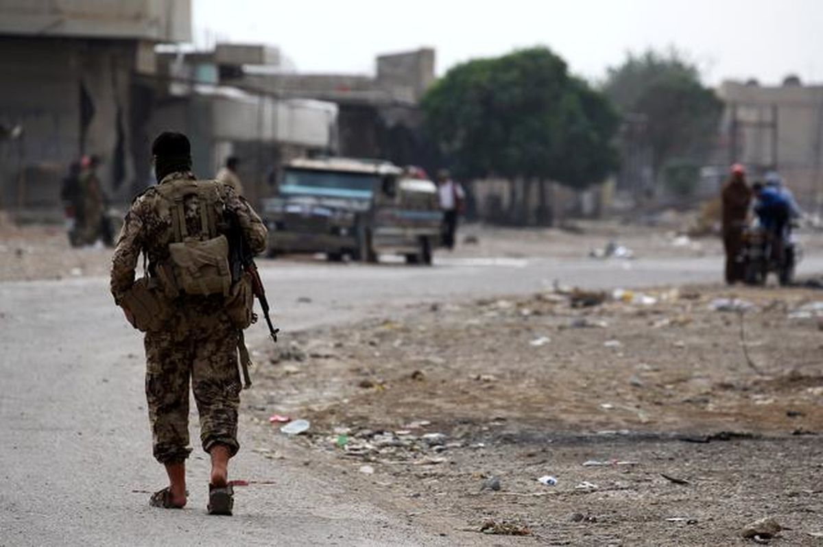 Kurdish-led forces say they have pulled out of Syria border town