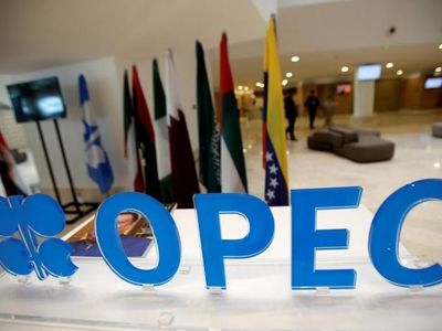 OPEC agrees modest oil output curbs in first deal since 2008