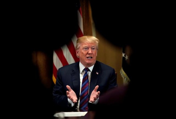 Trump weighs Syria options, Russia envoy says he 'cannot exclude' war
