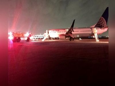 United airlines plane catches fire at Houston's Bush Airport
