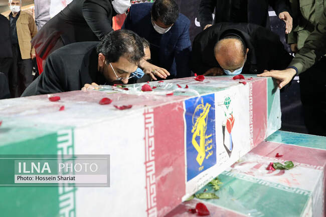 تدفین سه شهید گمنام در عرصه میدان شهدای مشهد