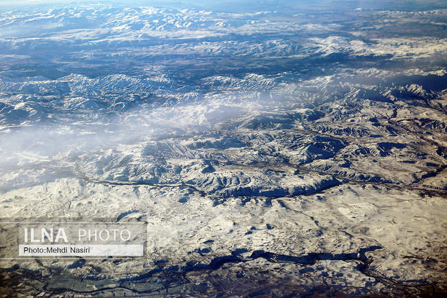 Aerial images of the snowy mountains on the border of Iran and Türkiye
