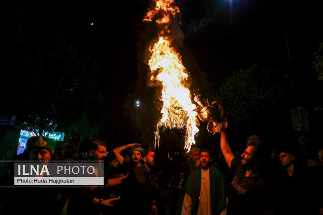 آیین مشعل گردانی دسته نجفی های مقیم قم
